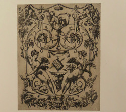 Ornamental design with two winged figures on a double volute, holding up leaf vines, on which a child is seen on the back and holds a mask in front of his head, from Douce Ornament Prints Album II