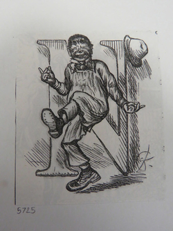 Man dancing in front of a letter 'N'