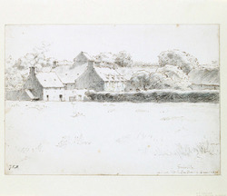 View of farm buildings across a field