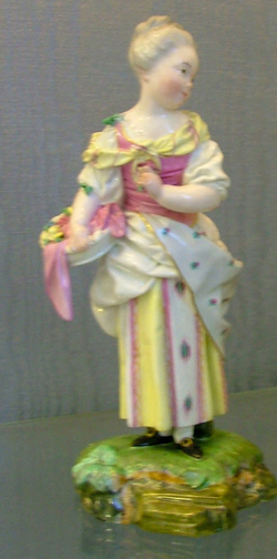 Girl with basket of flowers