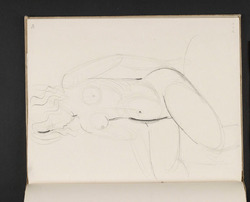 Seated female nude turning towards left