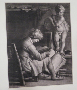 Boy seated in a Studio