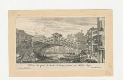 View of the Rialto bridge in Venice, with gondolas in the foreground