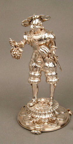 Figure of a man with fruits
