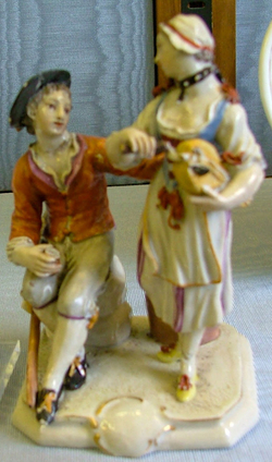 Hurdy-gurdy player and peasant