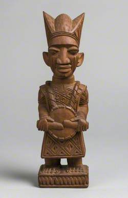 Male Figure with Drum and Headdress