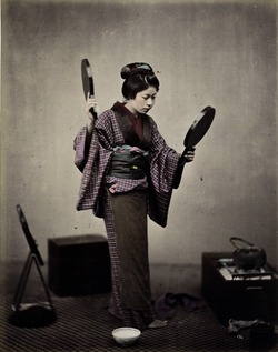 Young Woman Using Two Mirrors from the Album 'Views and Costumes of China and Japan' (Vol. 1)