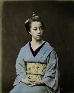 Young Woman in a Blue Kimono Holding a Fan from the Album 'Views and Costumes of China and Japan' (Vol. 1)