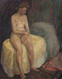 Seated Female Nude on Yellow Spread
