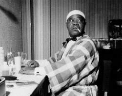 Louis Armstrong (1901–1971), Relaxing Backstage, Finsbury Park Astoria, London, 1962