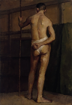 Male Figure Standing Holding a Staff