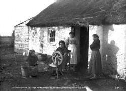 A Loughshore Cottage near Maghery, Winding Bobbins on an Old Wheel