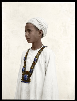 Egyptian Boy Wearing Tutankhamun's Pectoral