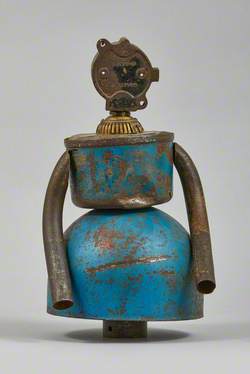 Metal Junk Sculpture: Woman with Blue Skirt