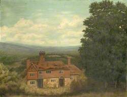 View of Cottage Surrounded by Woodland