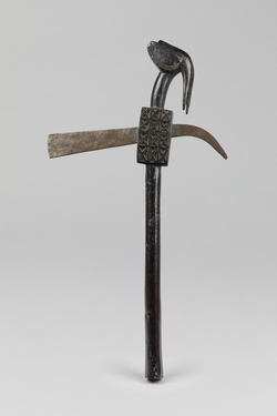 Ceremonial Axe with Carved Animal Head