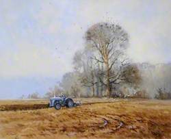 Tractor Ploughing a Field