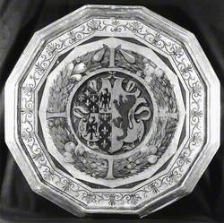 Shield with Two Arms Framed by a Garland