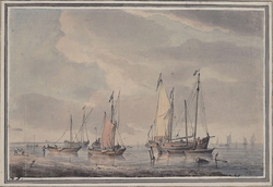 Seashore with fishing vessels at anchor