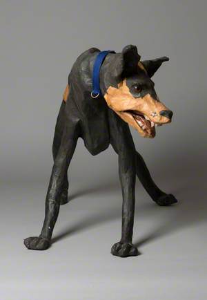 Brown and Black Dog with Blue Collar