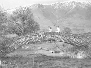 Two Girls on a Bridge