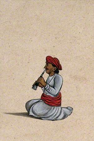 An Indian Musician Playing the Shehnai