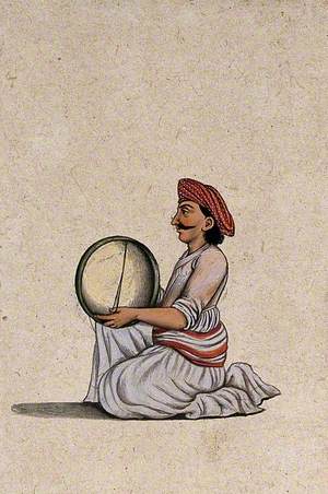 A Musician from Lucknow Playing the Tambourine