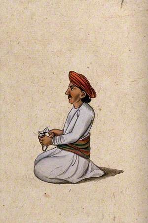 A Musician Holding a Shankh (Conch Shell)