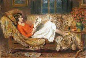 Irene Reading on a Chesterfield