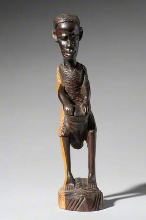 Two-Tone Sculpture of a Drummer Boy