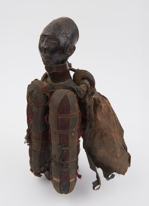 Anthropomorphic Figure with Bags