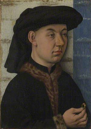 A Young Man holding a Ring