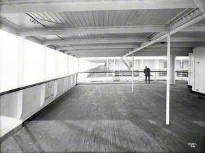 View forward from second class after promenade deck to first class promenade deck portside