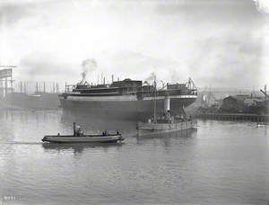 Port stern view afloat in Abercorn Basin after launch. Includes tug and No. 6 ferry