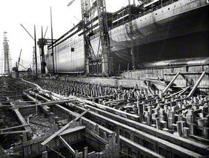 Port side view of hull looking forward, prior to launch, during reconstruction of slips 2 and 3