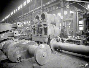 Crankshaft and other propelling machinery components in engine works prior to assembly