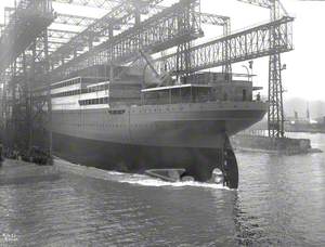 Launch; port stern view entering water