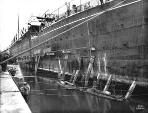 Sequence showing positioning of ship in flooded graving dock with supporting shores