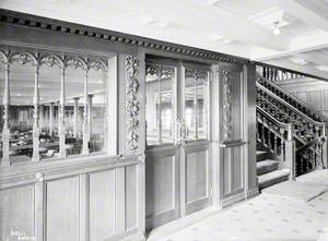 Staircase and entrance to first class dining saloon, with saloon beyond