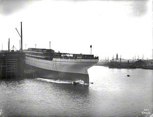 Launch; port stern view entering water