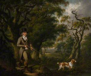 A Gentleman Shooting with a Spaniel