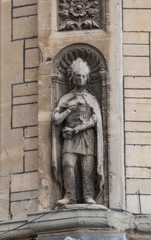 Carved Figures and Heads, Including Sir Walter Raleigh and a Native American