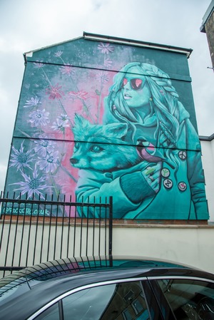Girl Holding Fox