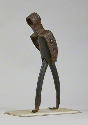 Metal Junk Sculpture: Person Walking