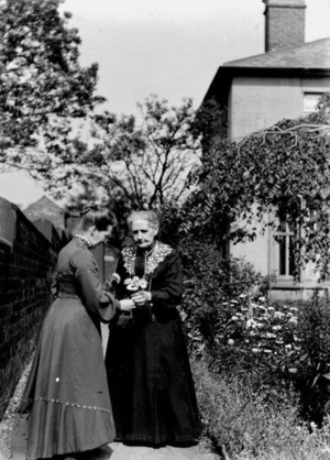 Two Women in Rear Garden