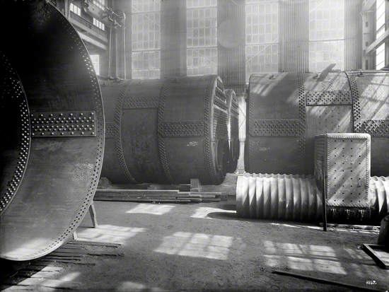 Boilers in course of construction in engine works boiler shop, including interior view of boiler shell