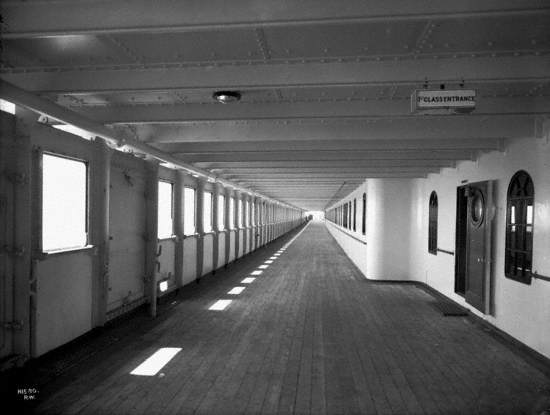 View aft along starboard enclosed promenade deck from first class entrance