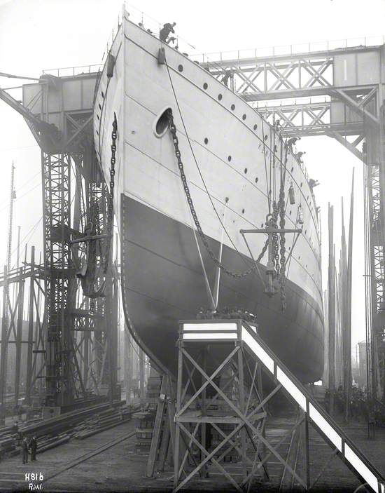 Port bow view on slip prior to launch, with launch party on platform