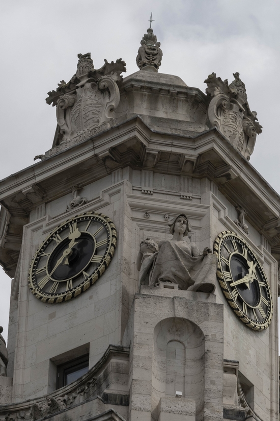 Clock Tower with Allegorical Figures and Heraldic Crest