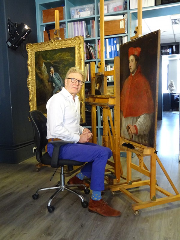 Simon with paintings from series three of 'Britain's Lost Masterpieces'